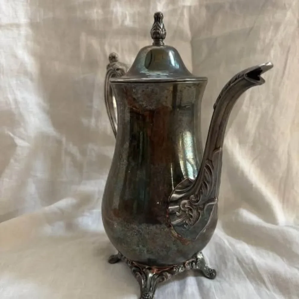Unbranded ornate silver